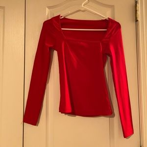 red long sleeve top